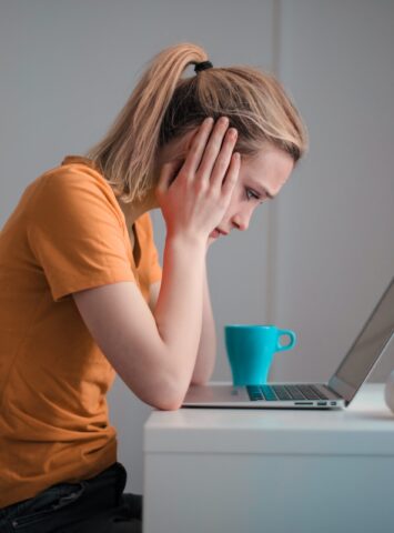 young-troubled-woman-using-laptop-at-home-3755755